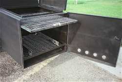 BBQ GRILLS SHOWING ON THE BBQ SMOKER FIREBOX 